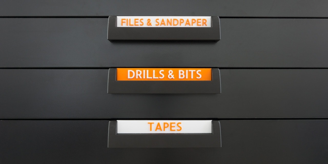 3D Printed labels and handles on an IKEA ALEX drawer cabinet.