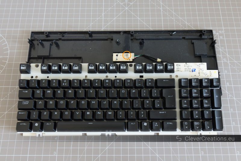 Top view of a partially disassembled QuickFire TK computer keyboard. 