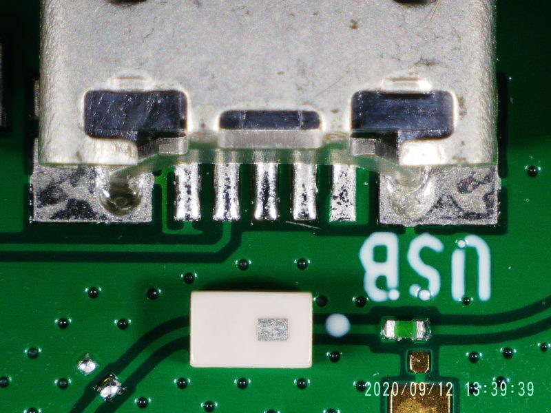 Pins on a SMD micro-USB connector.