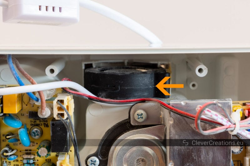 A blower fan inside the electronics compartment of a loud humidifier.