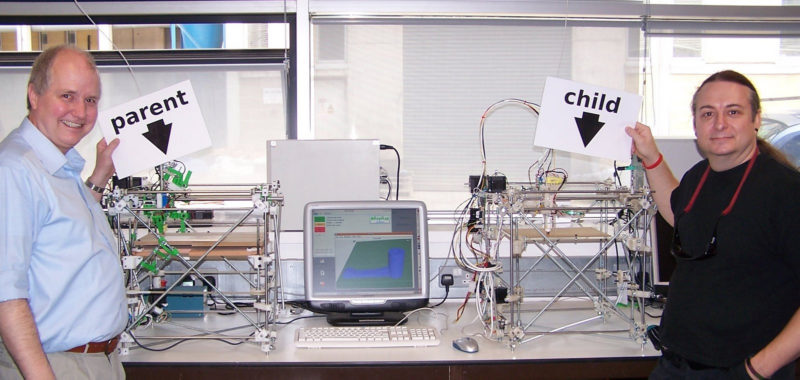 Early RepRap 3D printers - parent and child side by side