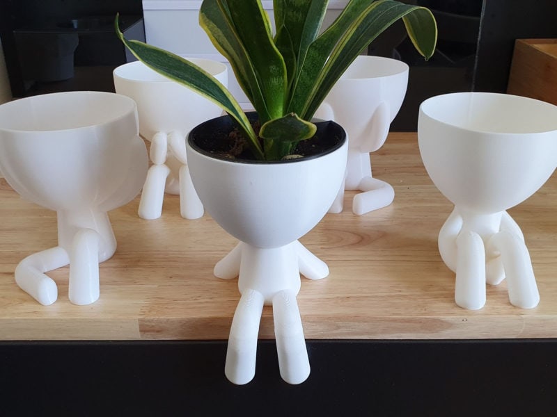 Several 3D printed hydroponic self-watering seed starters