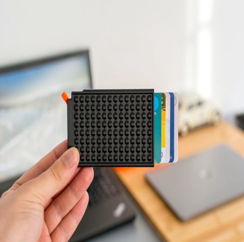 A slim 3D printed credit card wallet with ejector button