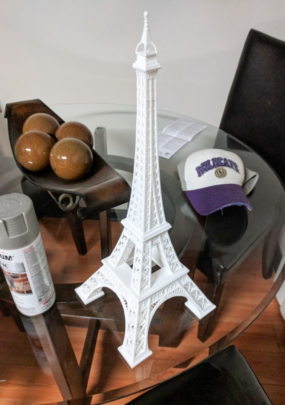 A large white 3D printed Eiffel tower.