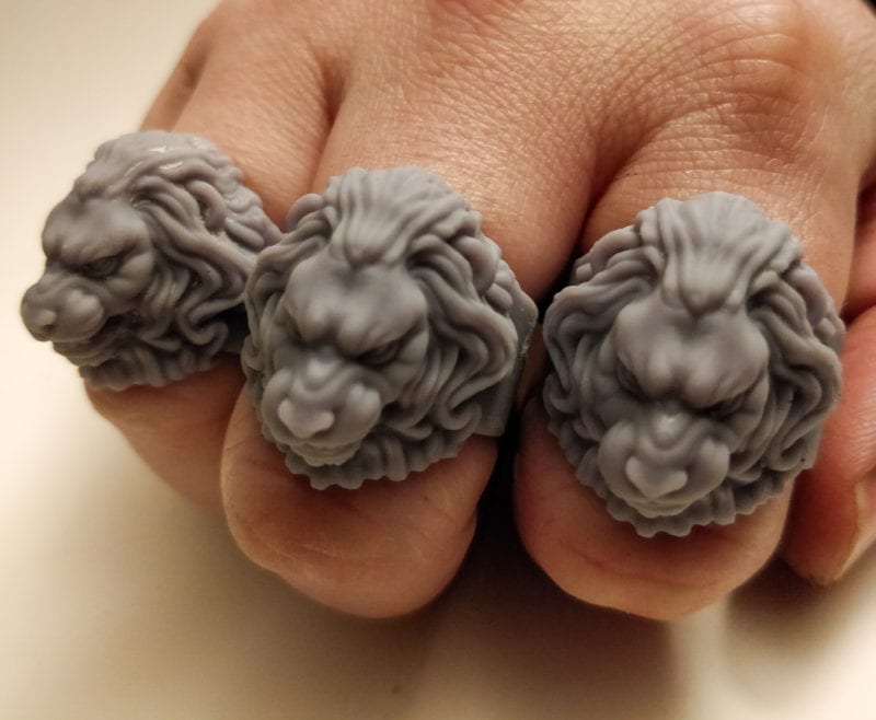 A set of lion rings jewelry that was created on a resin 3D printer