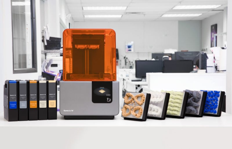 A professional lab with a SLA 3D printer and a variety of specialty resins
