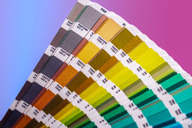 A fan of pantone color swatches