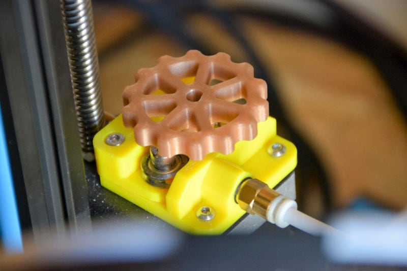 A 3D printer extruder with printed knob
