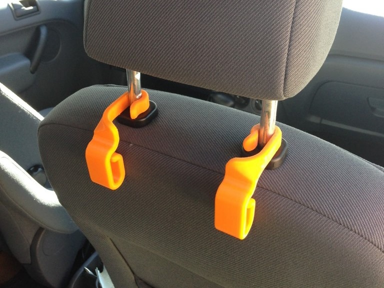 Two 3D printed trash bag holders for in a car