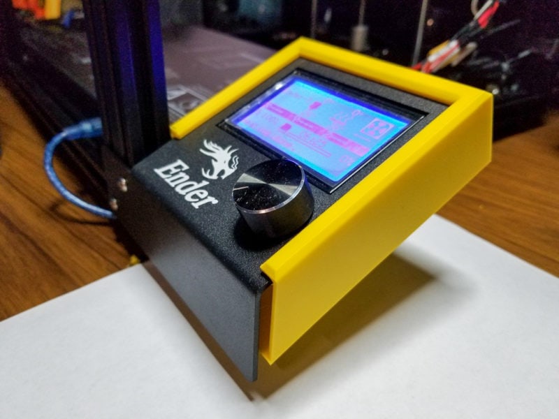 A yellow PCB cover upgrade for an Ender LCD
