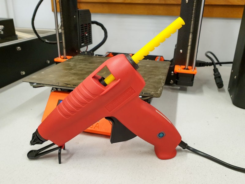 A 3D printed PLA stick in a hot glue gun