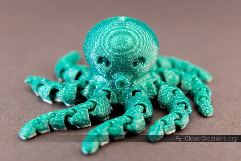 A Cute Mini Octopus printed in Smartfil Glitter Green PLA