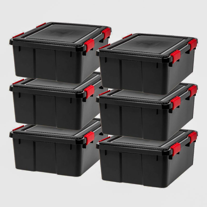 Six opaque black storage boxes