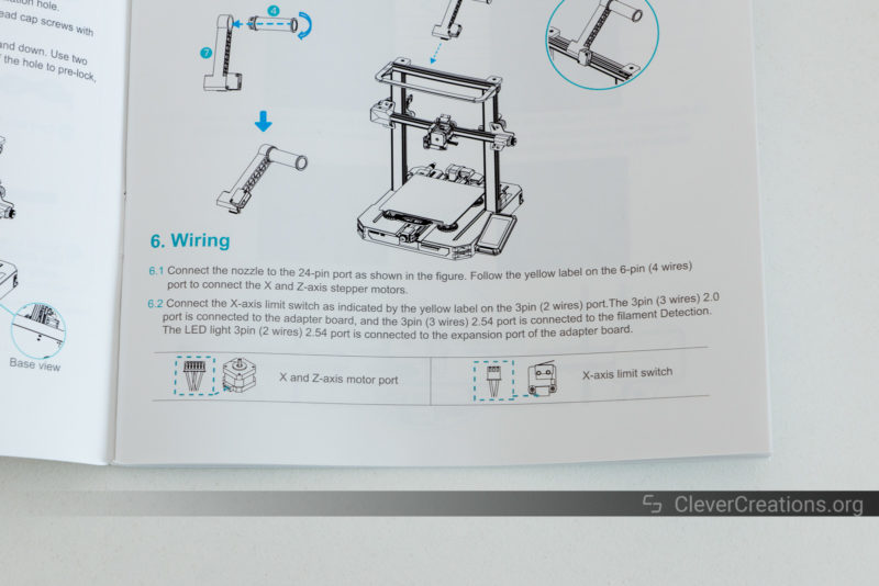 The Ender 3 S1 Pro manual open at the wiring instructions