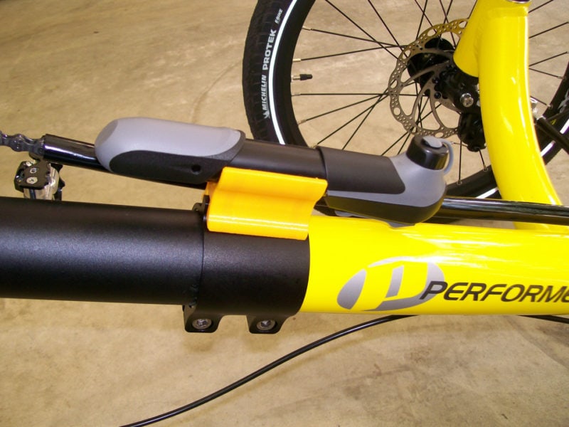 A 3D printed bike accessory in yellow ASA filament