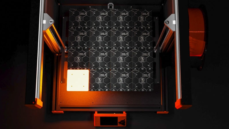 Top view of a multi-element print bed grid with one element lit up