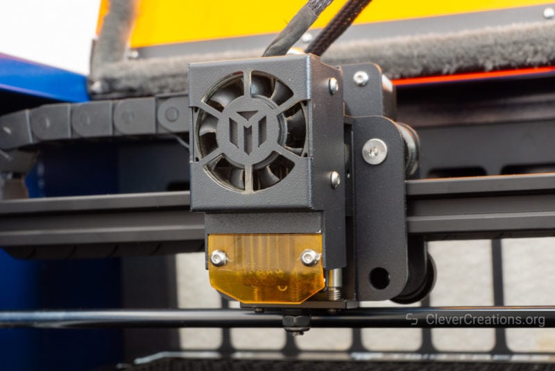 A close-up of a laser engraver/cutter head with a 10W 440nm laser module
