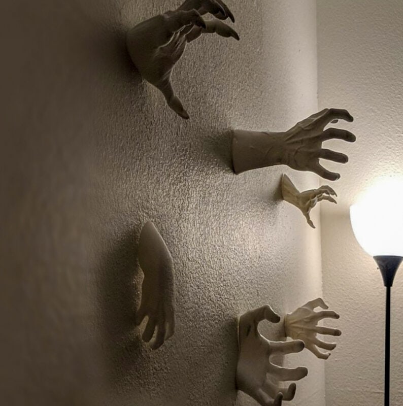 3D printed spooky hands coming out of a wall