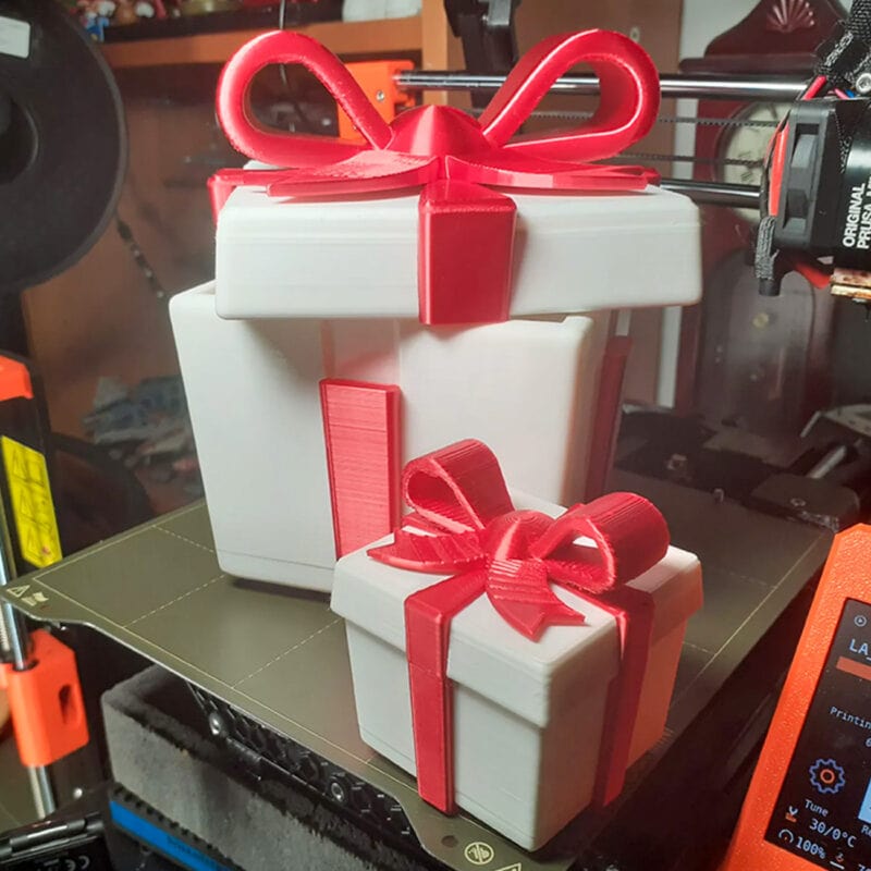 Two 3D printed gift boxes inside of a Prusa i3
