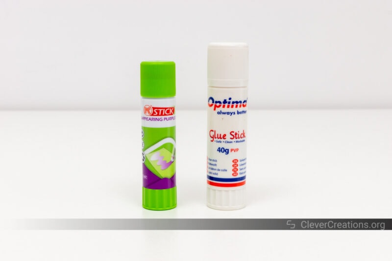 Two glue sticks used as 3D printer accessories