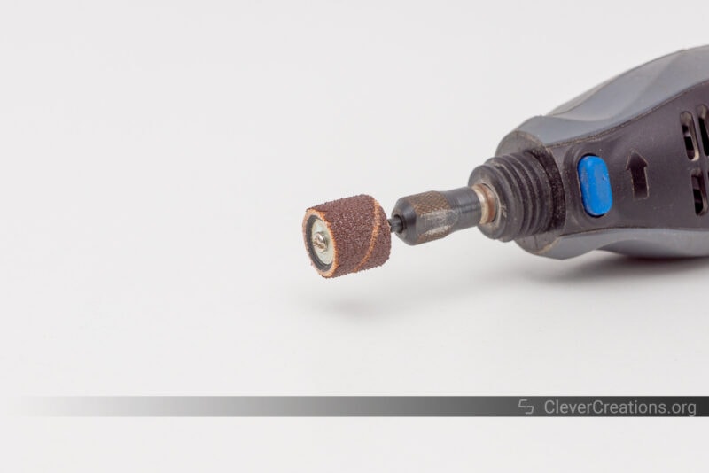 A Dremel rotary tool with sanding attachment