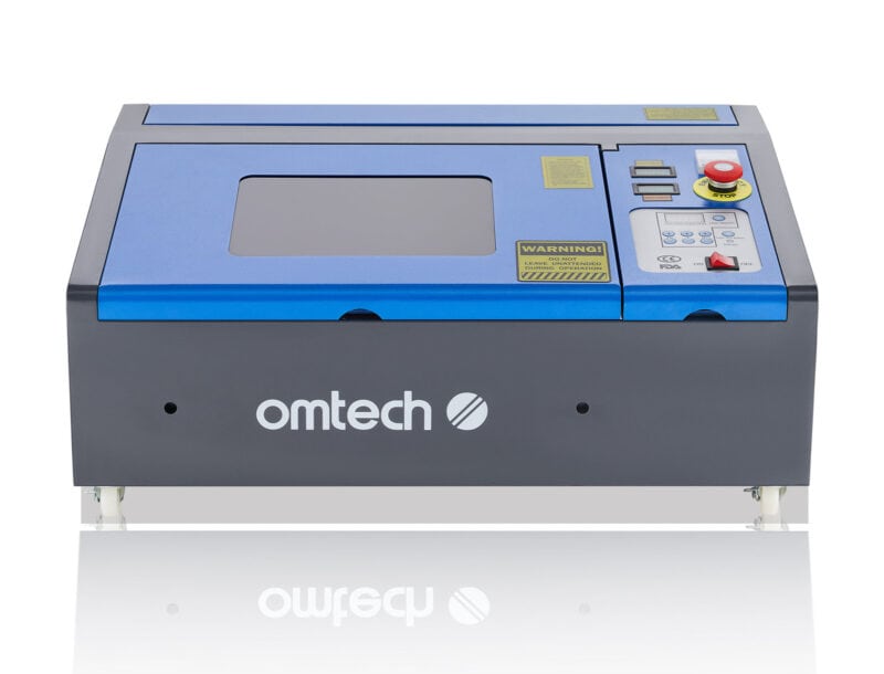 A closed blue OMTech K40 laser cutter on a white background