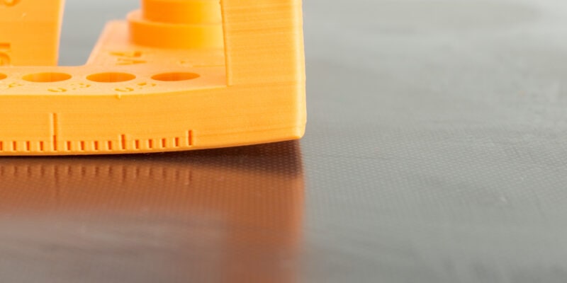 PLA not sticking to bed on a 3D print with poor bed adhesion