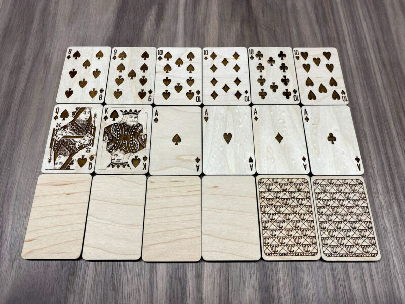 A collection of wooden playing cards as a laser cutter idea