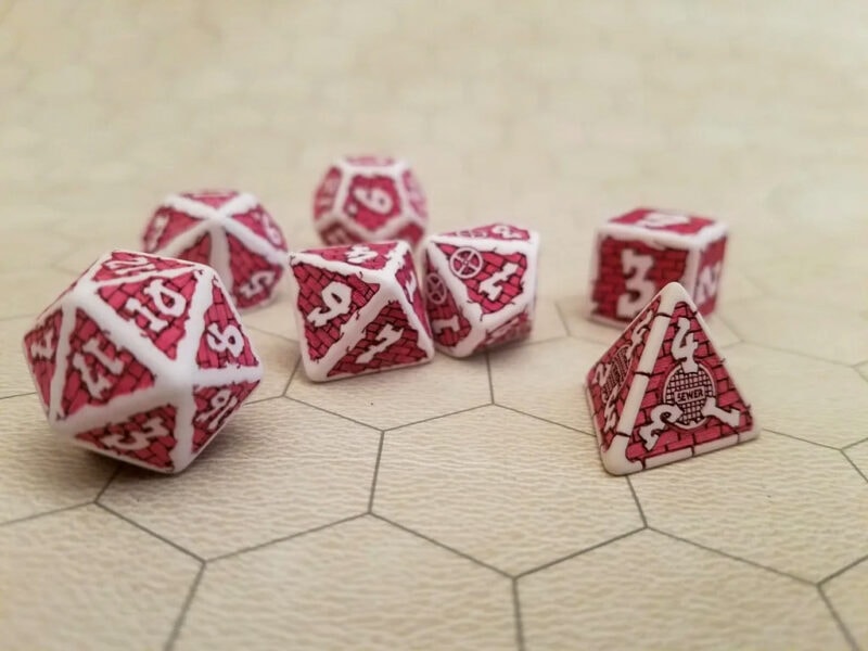 A set of graffiti laser engraved dice in various sizes