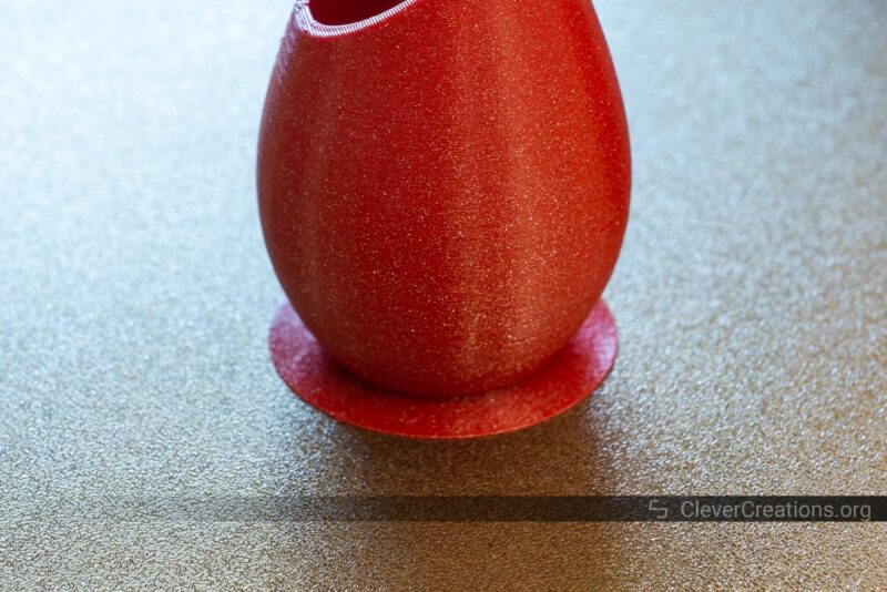 A 3D printed vase with brim on a PEI-coated print bed