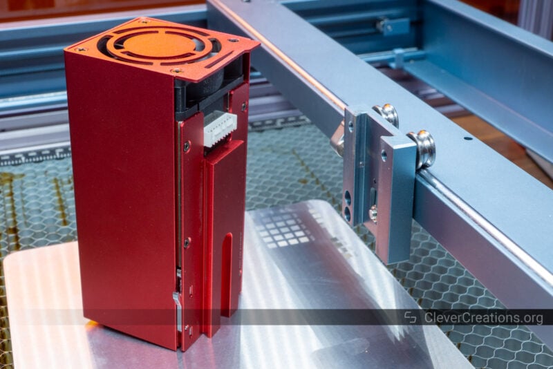 An xTool 1065nm infrared laser module inside of the D1 Pro engraver machine.