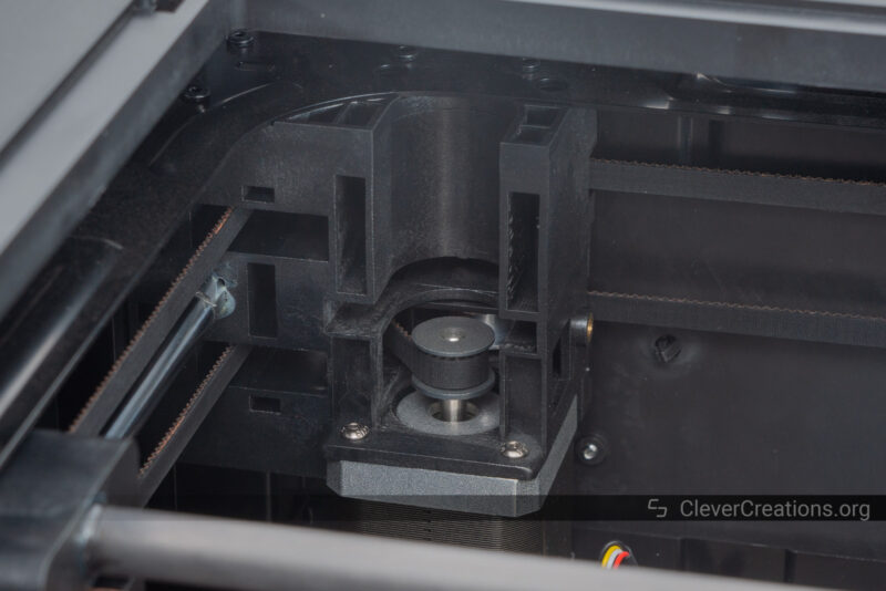 An black injection molded plastic CoreXY mounting bracket