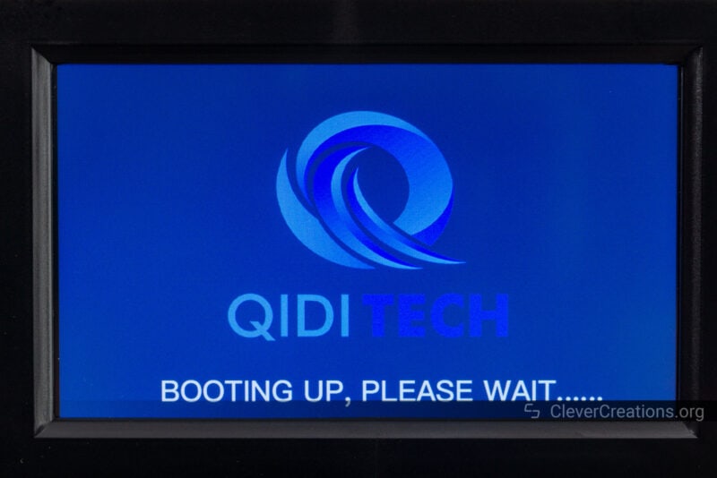 A 3D printer LCD screen with its boot up process displayed