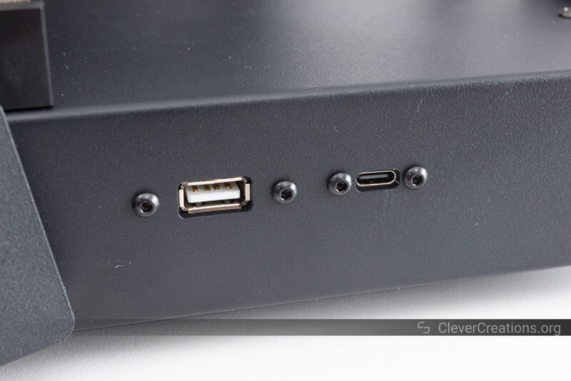A USB-A and USB-C port on the front of a 3D printer