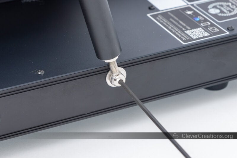 An allen key used to fasten a pull rod in place on a 3D printer