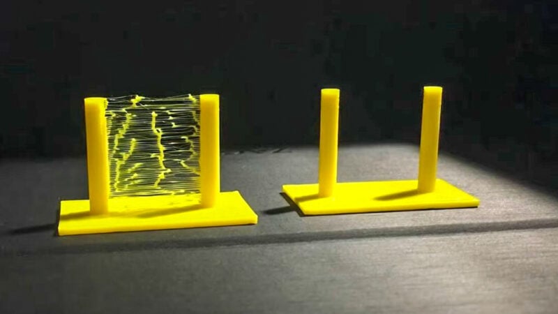 Two yellow 3D prints, one with stringing and one without.