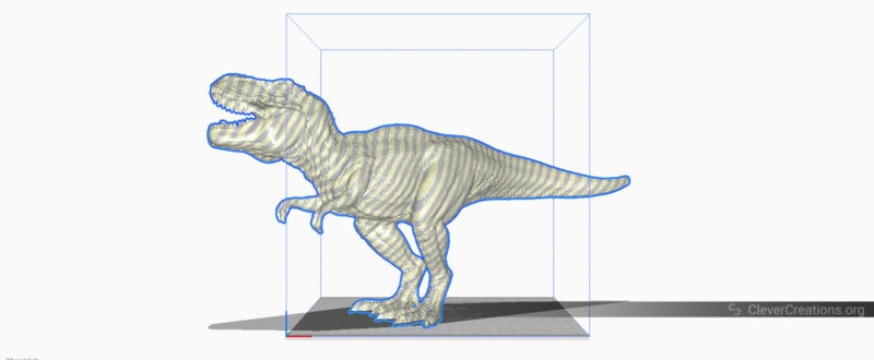 A 3D model of a T-rex falling outside a 3D print slicer's build volume