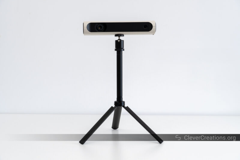 The 3DMakerPro Lynx 3D scanner attached to its tripod accessory on a white table