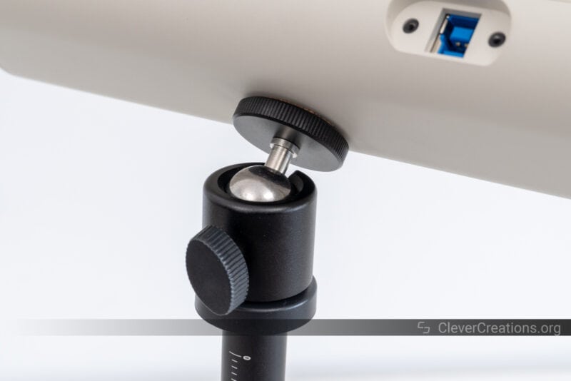 A tripod with ballhead attached to a 3D scanner