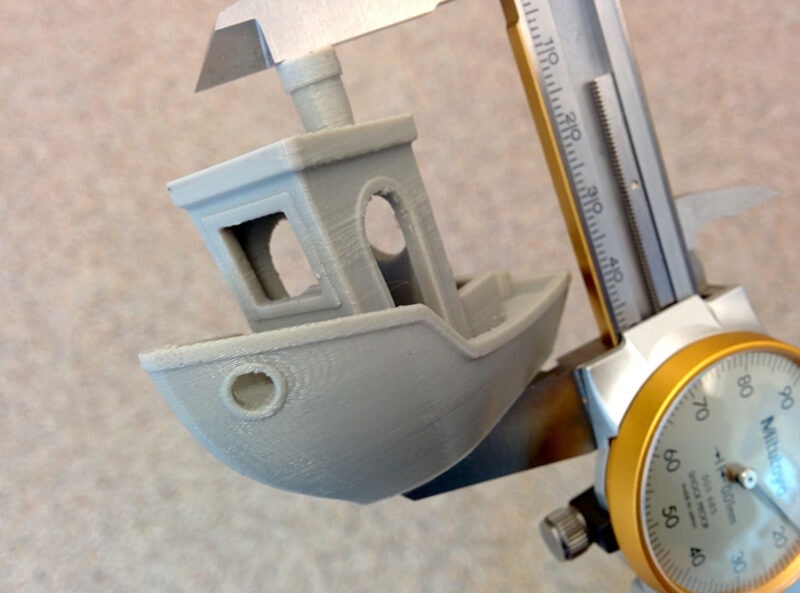 A Mitotoyo caliper measuring a 3D print made with filament that has not gone bad