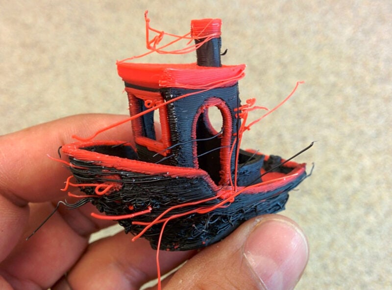 A benchy 3D print made with old filament that has expired