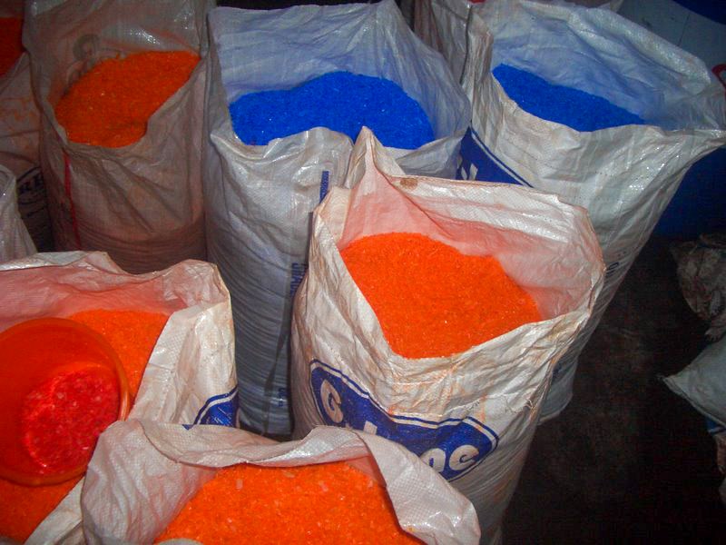 Various bags of biodegradable PLA filament pellets