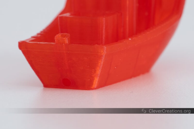 A red 3D printed benchy without layer shifting