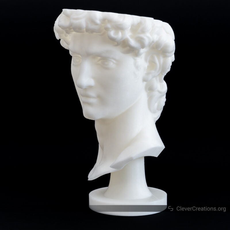 A 3D printed bust of David in white hyper PLA