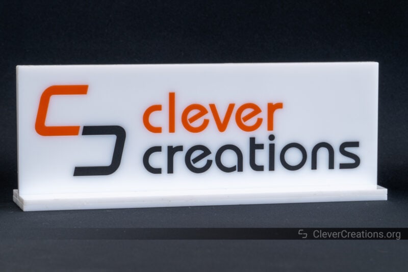 A laser cut inlay logo of Clever Creations