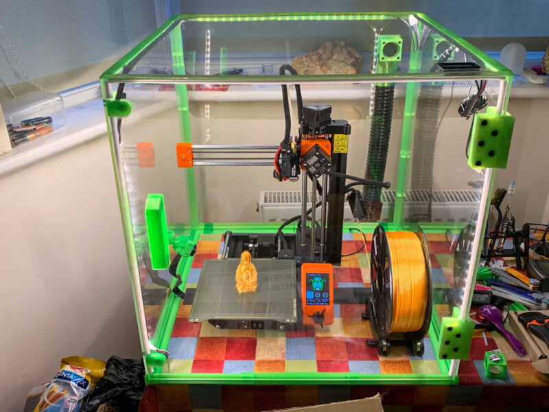 A 3D printer printing ABS inside of an enclosure.