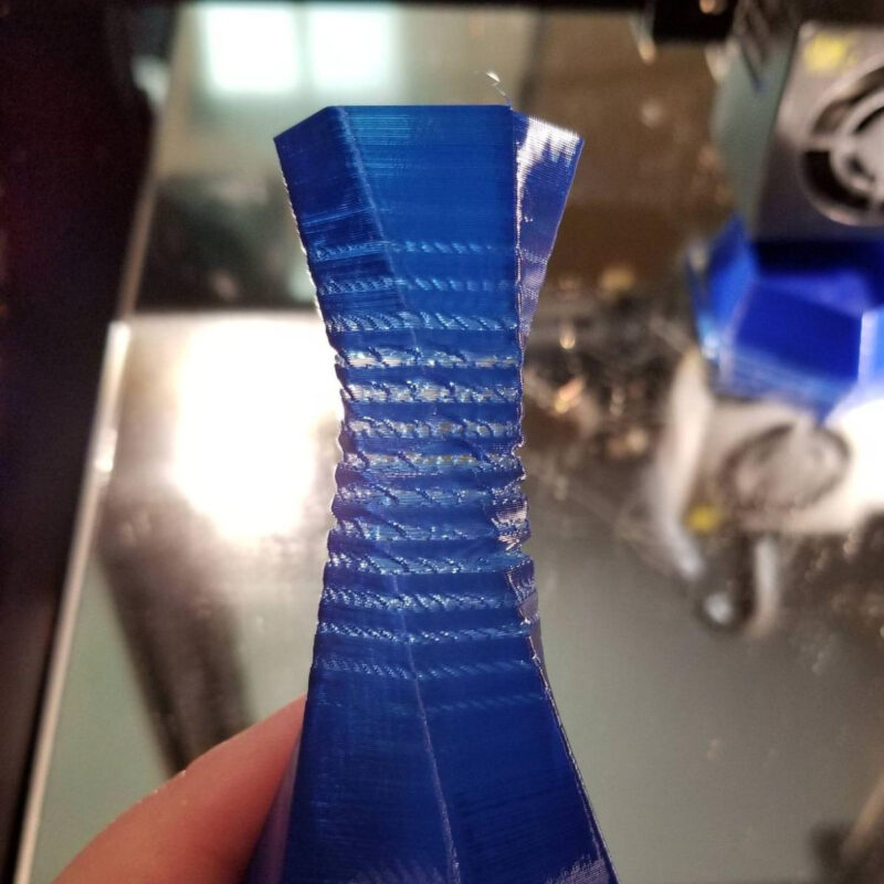 A 3D printed vase with underextrusion symptoms