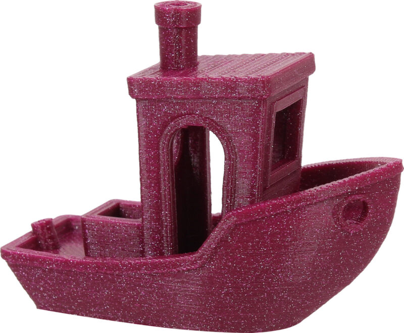 A 3D printed benchy in glitter PLA