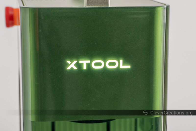 The 'xTool' logo lit up on one of the company's machines.