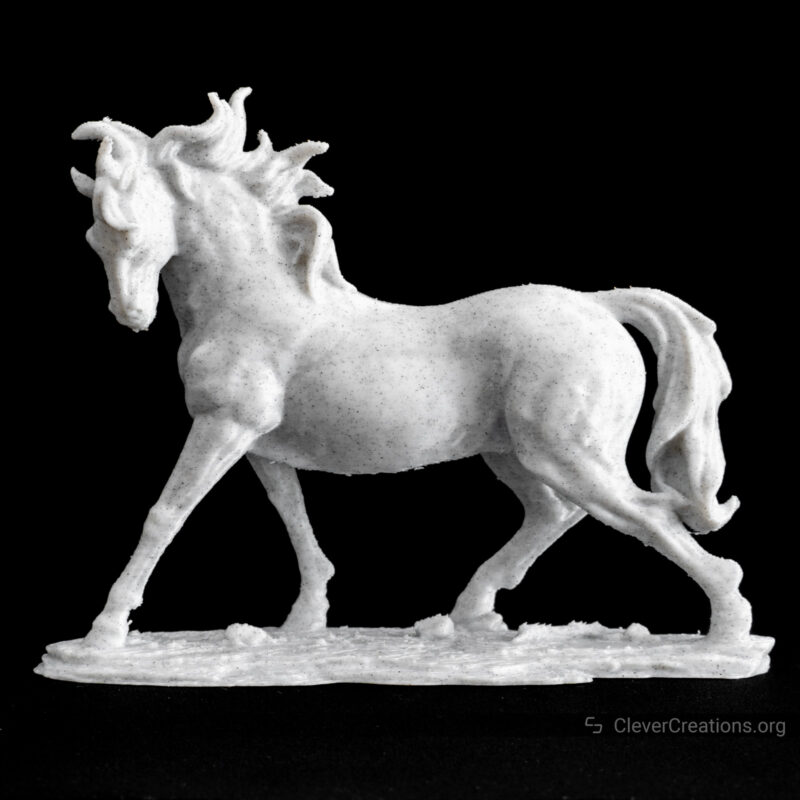 A 3D printed white marble horse in front of a black background.